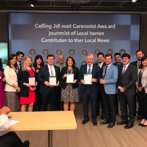 KCTV5 staff celebrating their awards at a ceremony