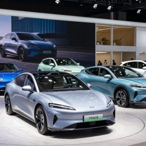 Various electric, hybrid, and gasoline vehicles displayed at the Detroit Auto Show.