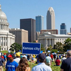 Kansas City skyline with elements symbolizing civic engagement