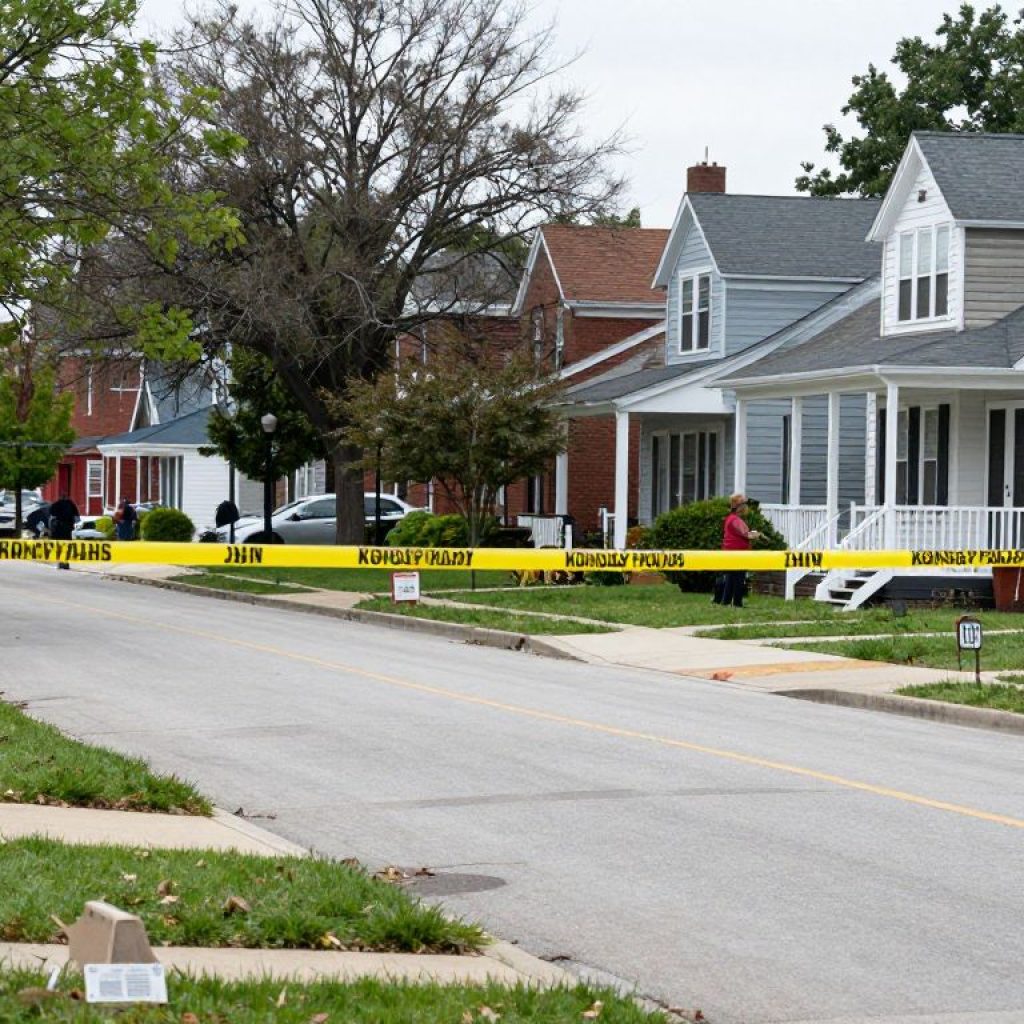 Police presence in a Kansas City neighborhood following a shooting incident