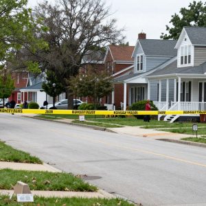 Police presence in a Kansas City neighborhood following a shooting incident