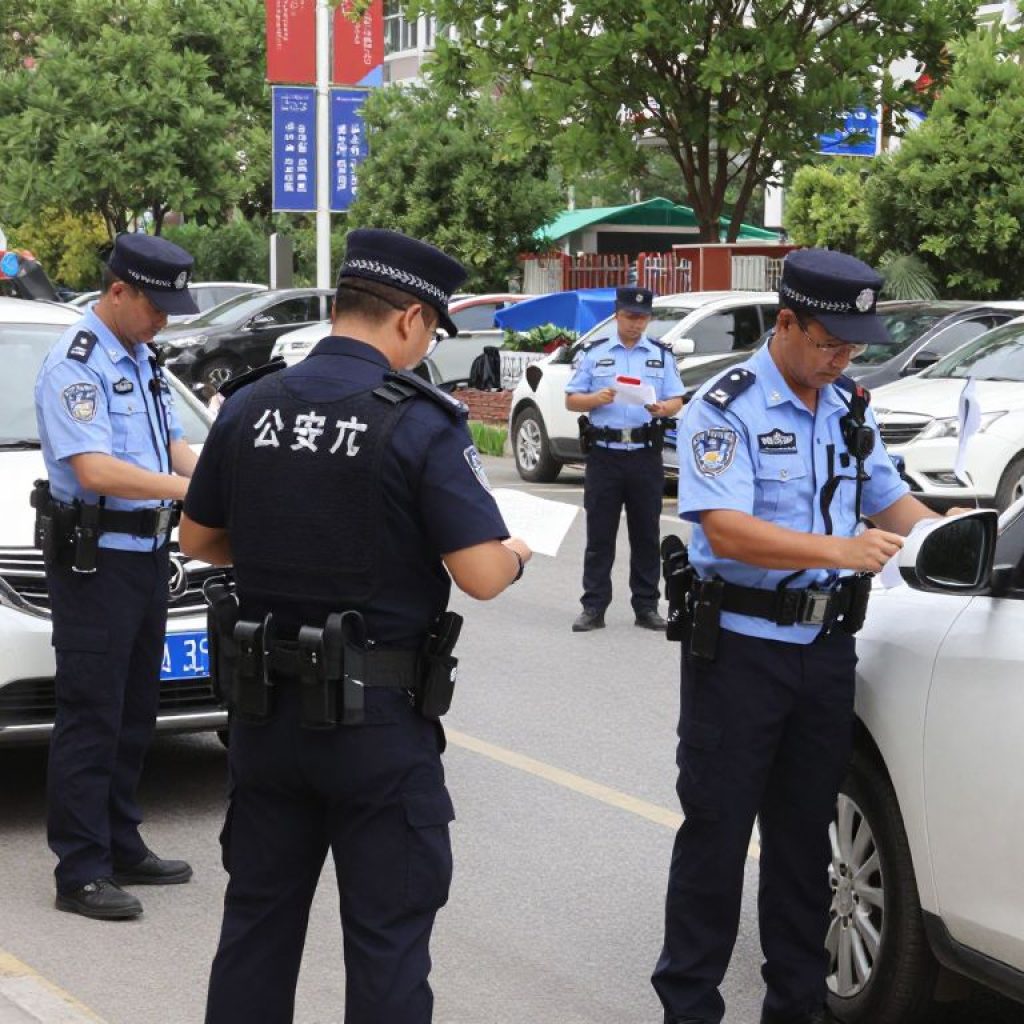 Police officers investigating a crime scene in Kansas City