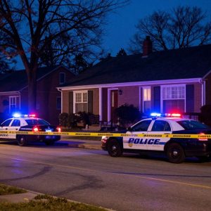 Police presence at a shooting scene in Kansas City residential area