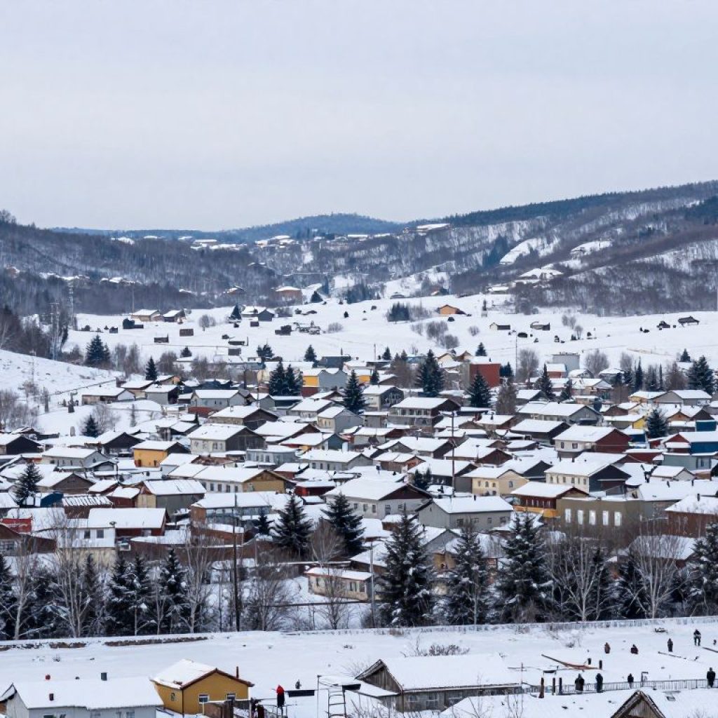 A peaceful winter scene depicting a snowy landscape in Emporia.