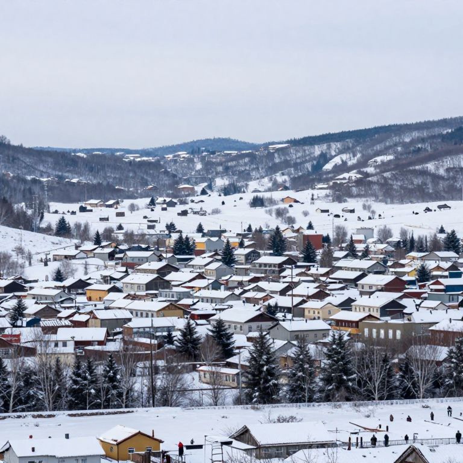 A peaceful winter scene depicting a snowy landscape in Emporia.