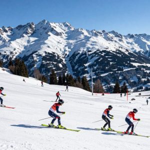 Athletes participating in winter sports against the backdrop of the Italian Alps during the Winter Olympics.