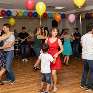 Families dancing together at the inclusive sweetheart dance in Kansas City