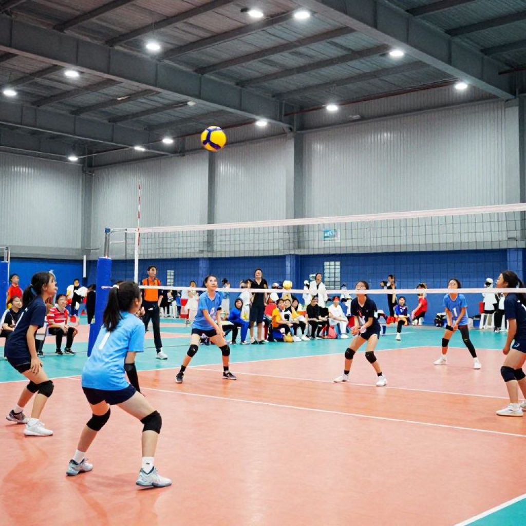 Young athletes competing in a volleyball tournament at Kansas City.