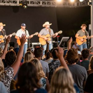 Fans enjoying a live concert by Megan Moroney