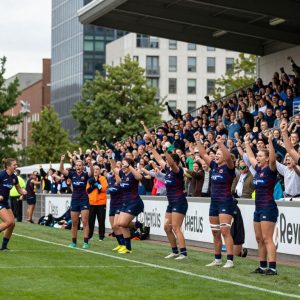 Women playing rugby at the Pacific Four tournament in Kansas City