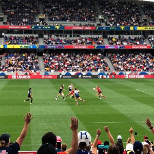Exciting women's rugby match with players from prestigious teams